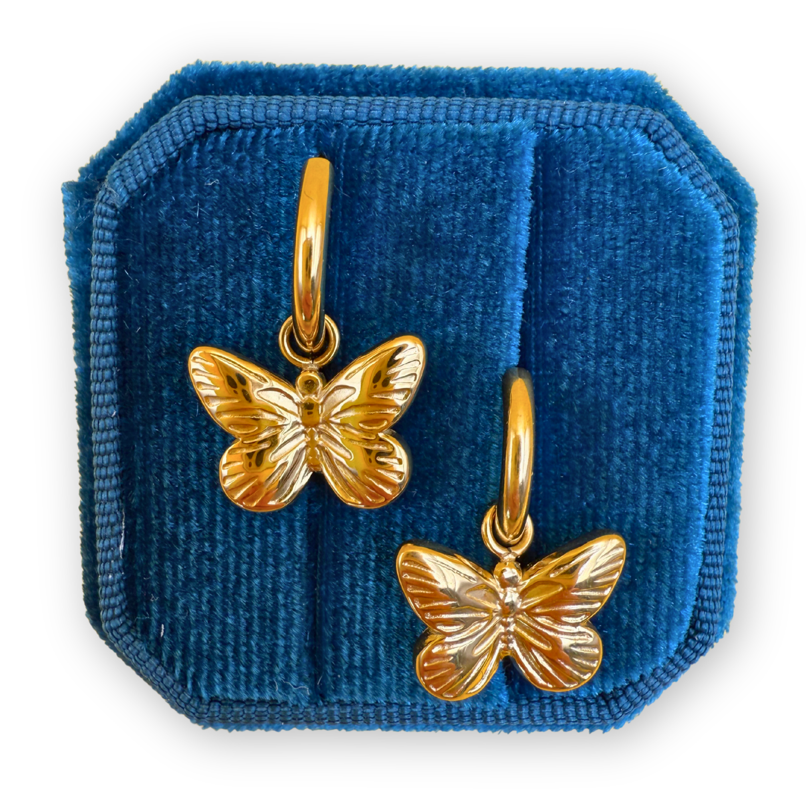 Close-up of Gold Butterfly Hoop Earrings showing polished gold finish and butterfly charm.